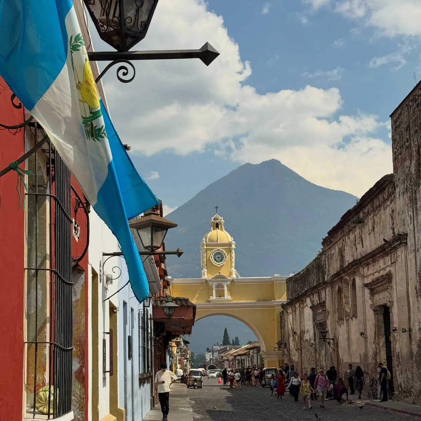 The yellow arch of Santa Catalina and a volcano