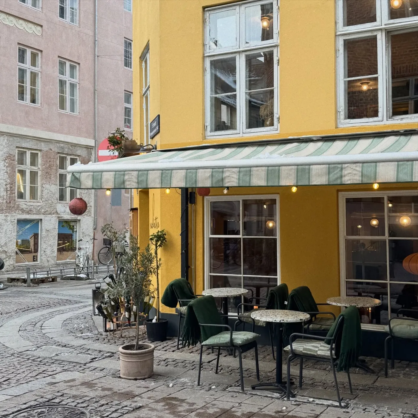 A yellow café on a cobbled corner, Copenhagen